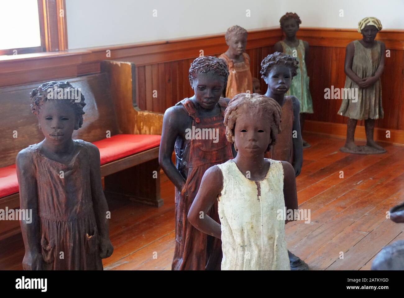 Edgard, Louisiana, U.S.A - February 2, 2020 - The statues of the African American children inside the church near Whitney Plantation Stock Photo