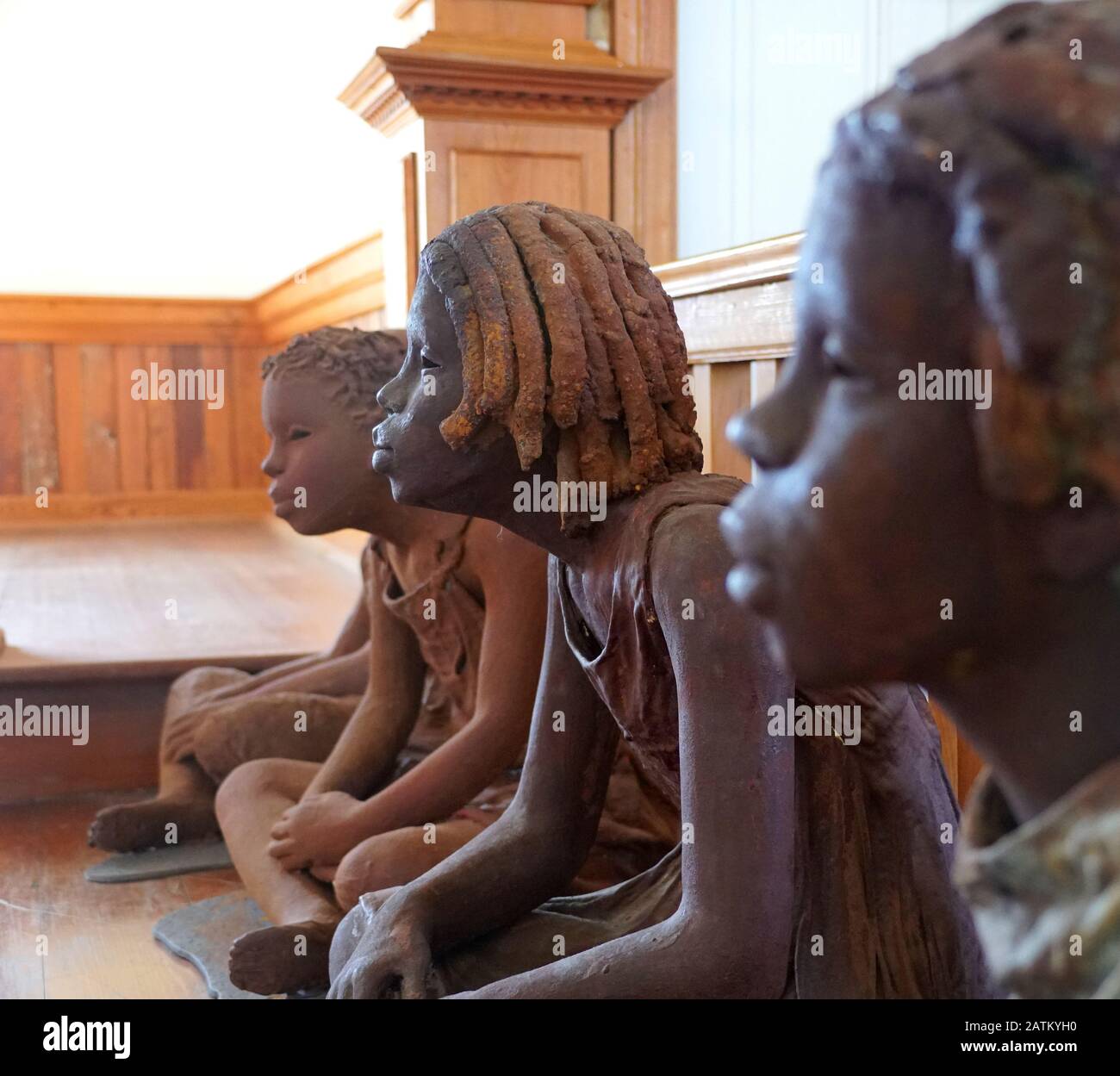 Edgard, Louisiana, U.S.A - February 2, 2020 - The statues of the African American girls inside the church near Whitney Plantation Stock Photo