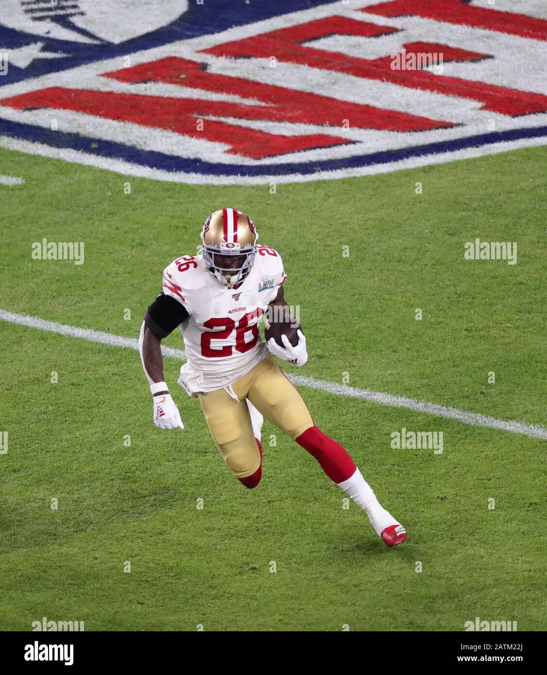 Miami Gardens, Florida, USA. 02nd Feb, 2020. San Francisco 49ers running back Tevin Coleman (26) runs with the ball during the Super Bowl LIV game against the Kansas City Chiefs at the Hard Rock Stadium in Miami Gardens, Florida. Mario Houben/CSM/Alamy Live News Stock Photo