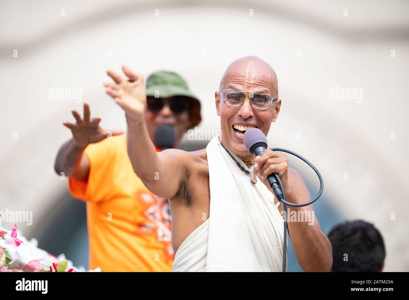 Chicago, Illinois, USA - August 8, 2019: The Bud Billiken Parade, Members of the Iskcon Chicago, going down MLK street at the parade Stock Photo