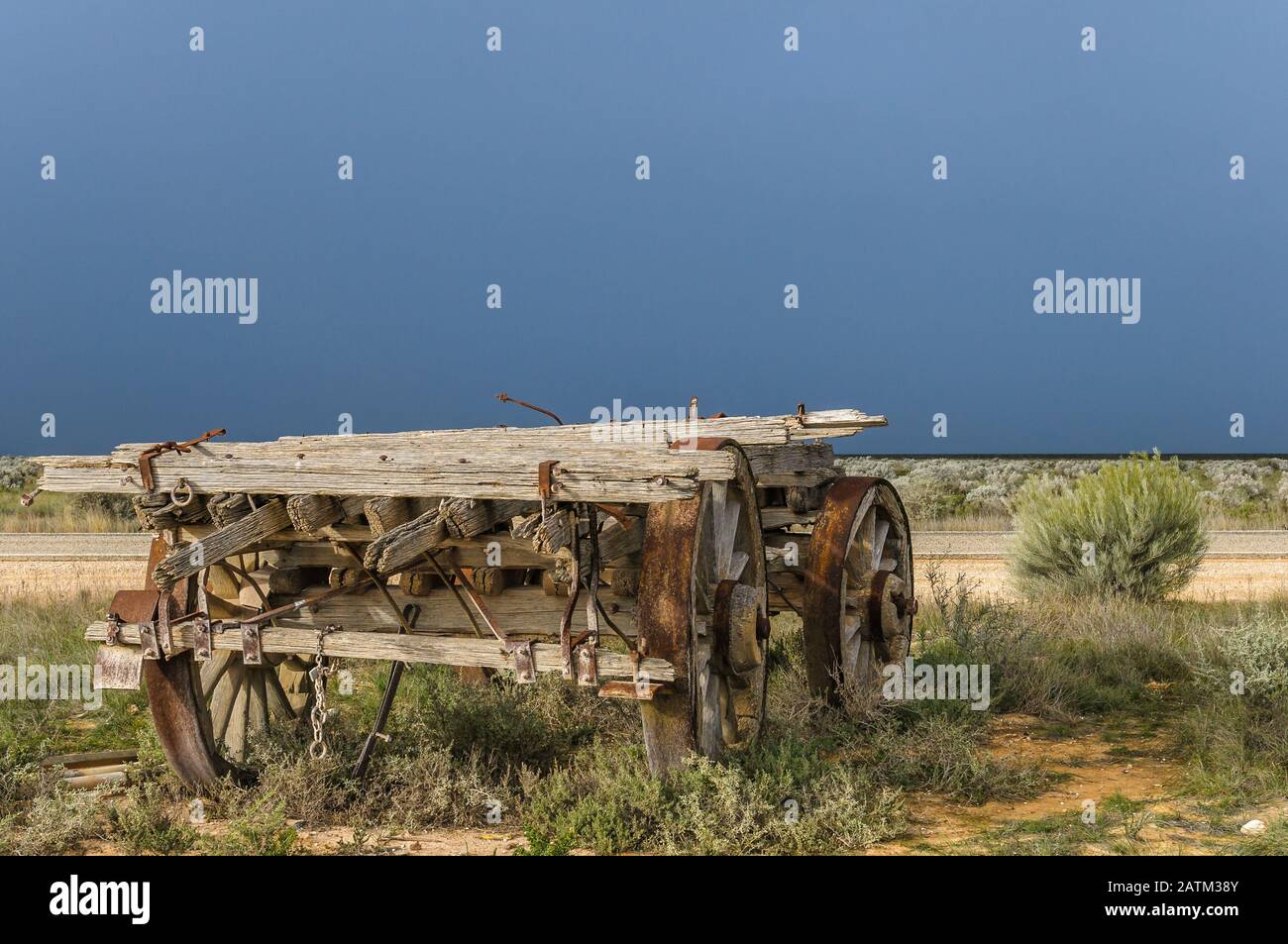 Historical old wagon transport on display on the Nullarbor Plain with dramatic storm threatening. Stock Photo