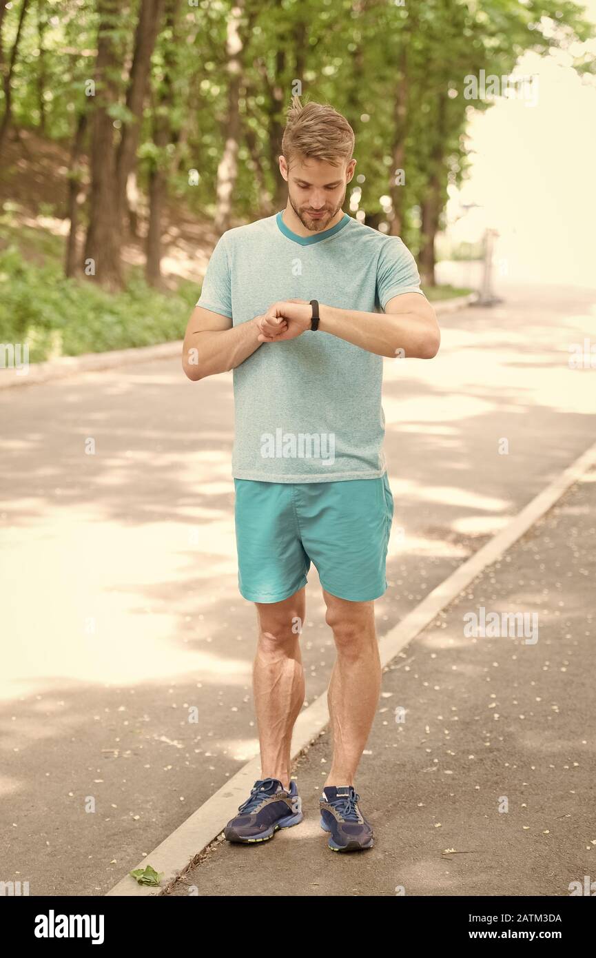 Sports Watch Man Making Sport Outdoor Sportswear Fashion Health And Fitness Sportsman Full Of Energy Sportsman Practising Sport Activities Tracking Training With Sports Watch Fitness Bracelet Stock Photo Alamy