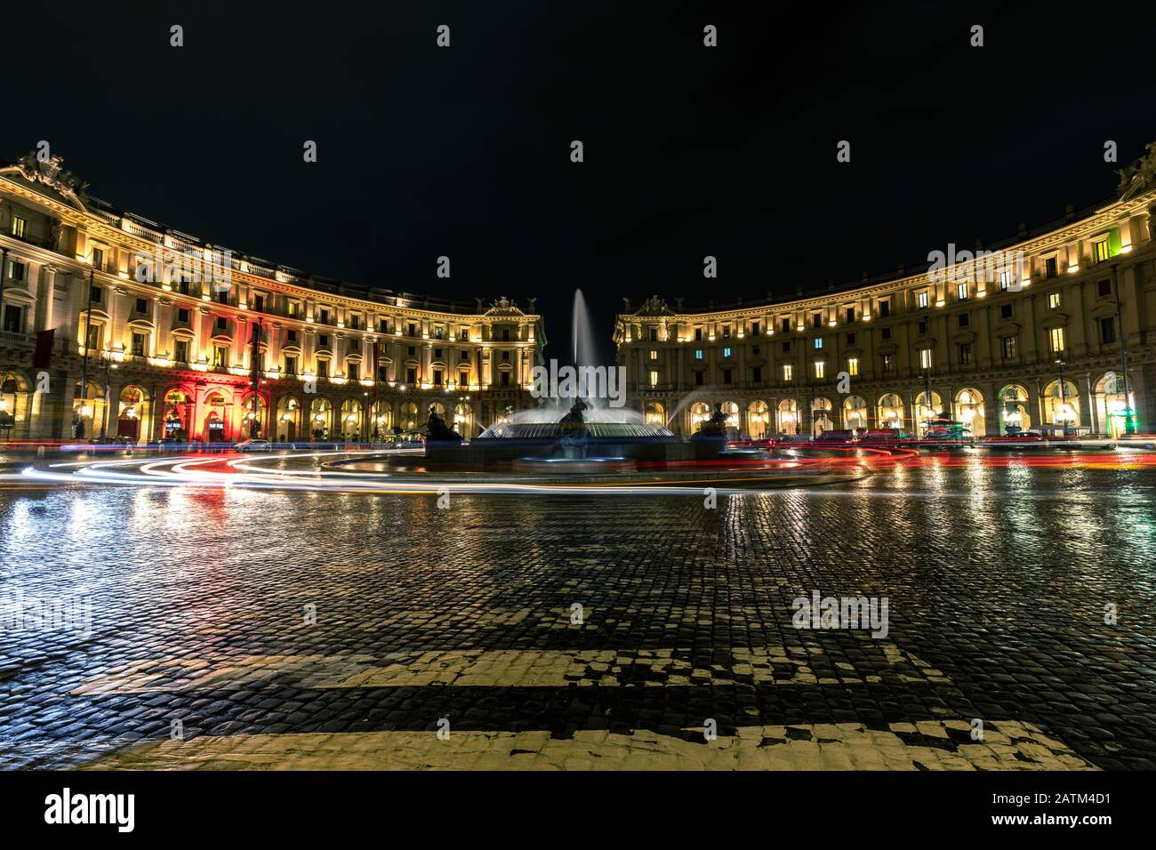 October 18,2019 Piazza della Repubblica, Rome Italy.lights reflection on the road after rain at night, Piazza della Repubblica is a semi-circular piaz Stock Photo