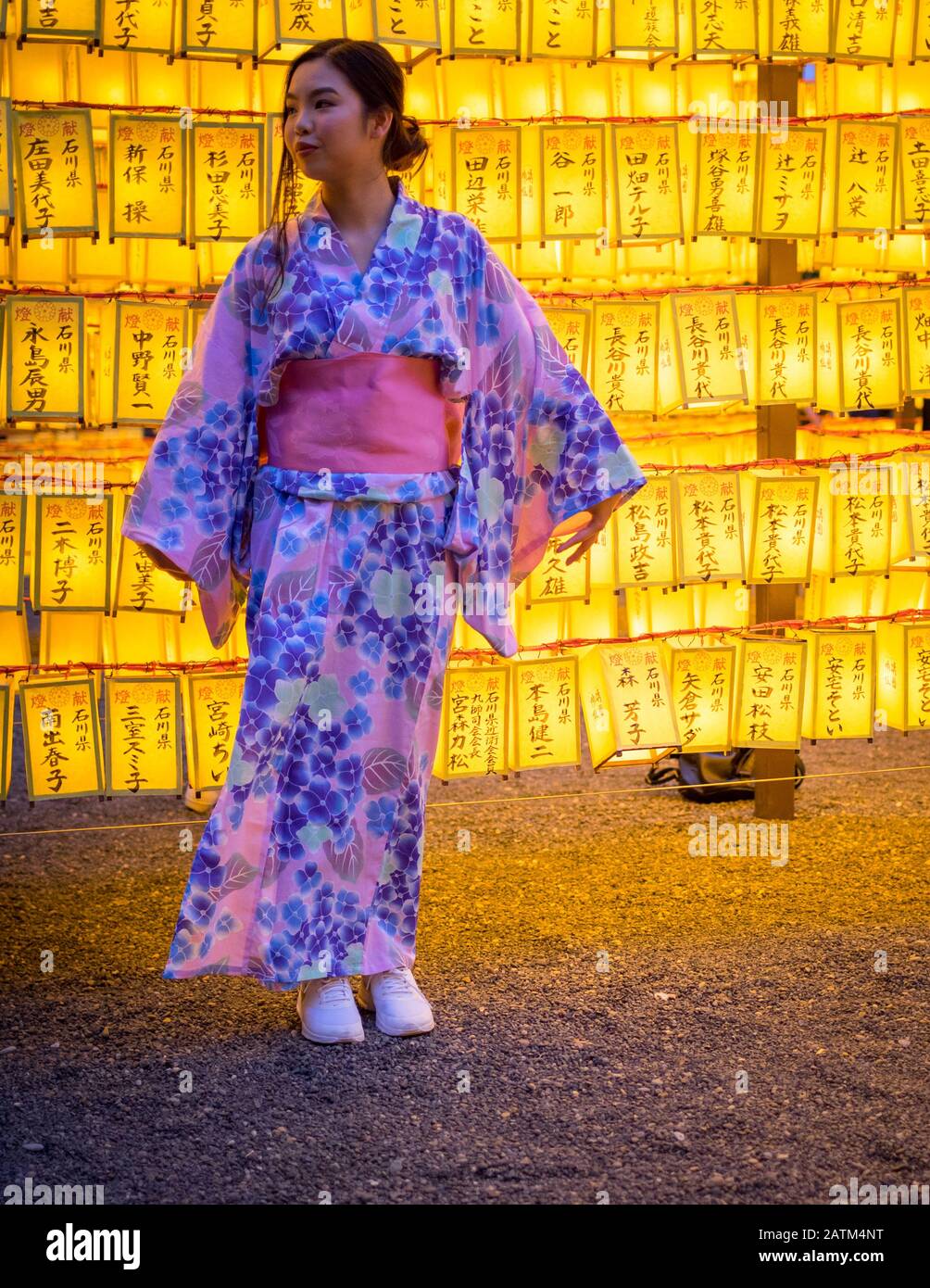 Japanese girl in a yukata kimono, 2018 Mitama Matsuri (Mitama Festival), a famous Japanese Obon (Bon) summer festival. Yasukuni Shrine, Tokyo, Japan. Stock Photo