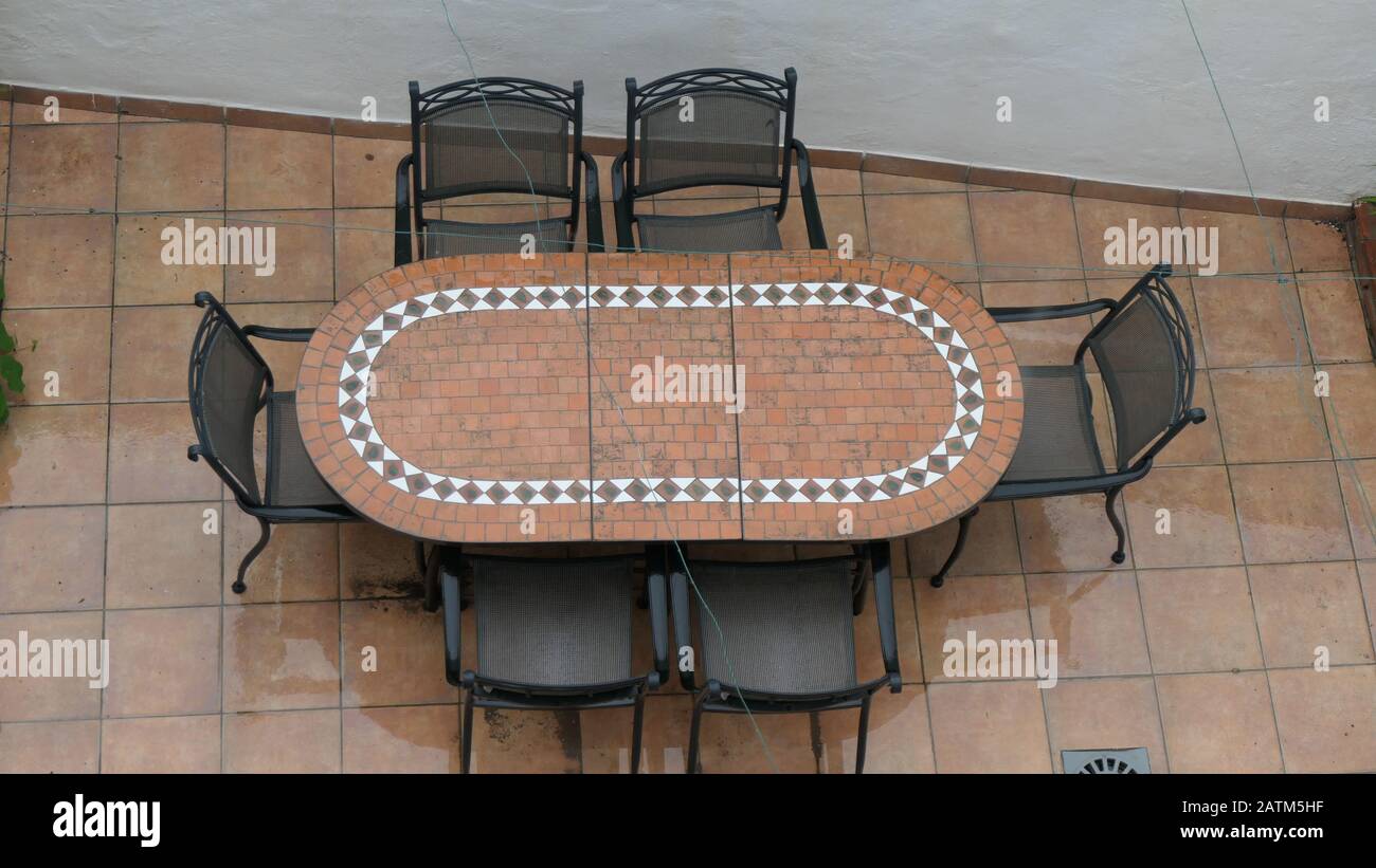 Top down view of patio furniture on rainy winters day Stock Photo Alamy