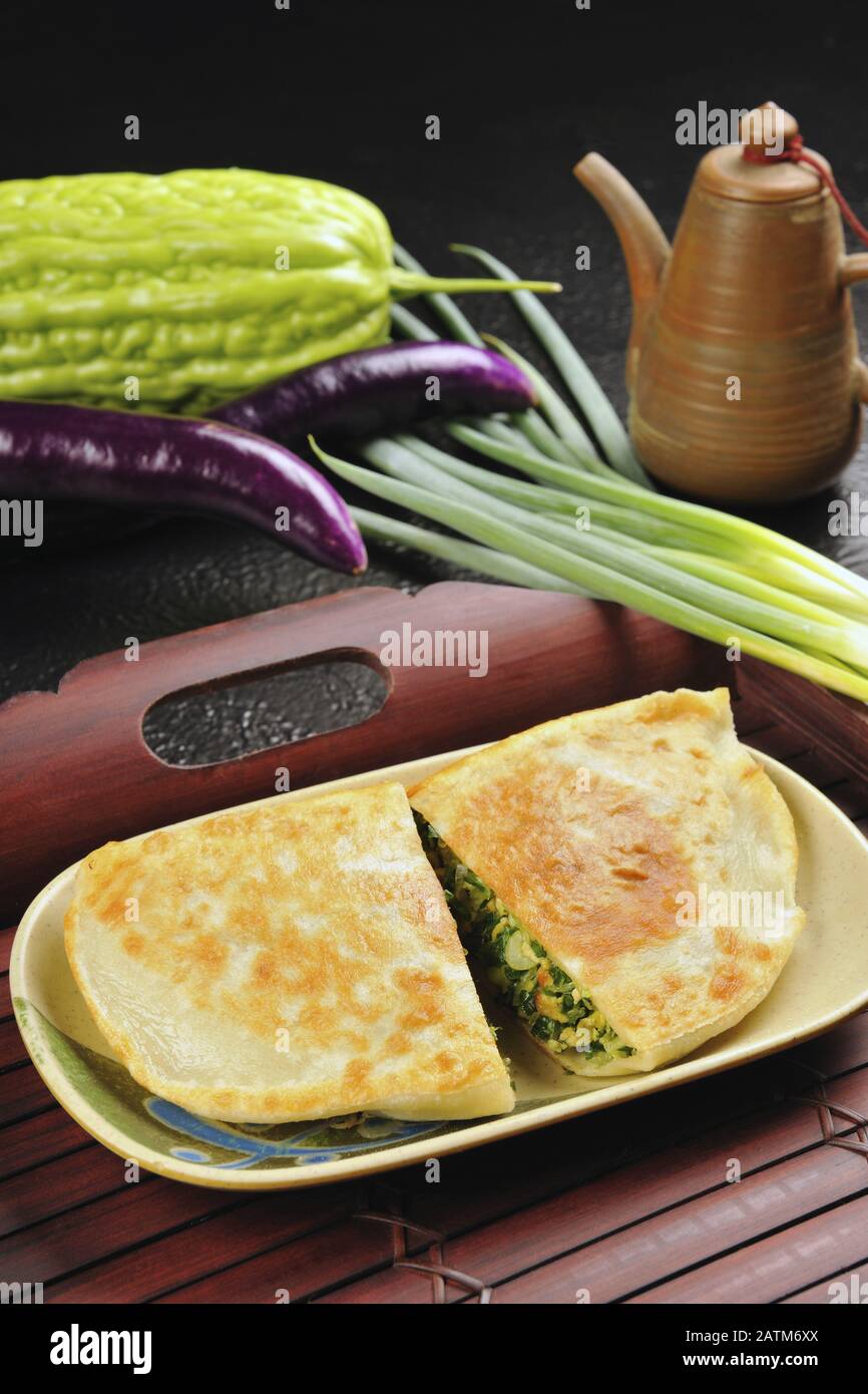 Food portrait of pan fried leek dumplings Stock Photo Alamy