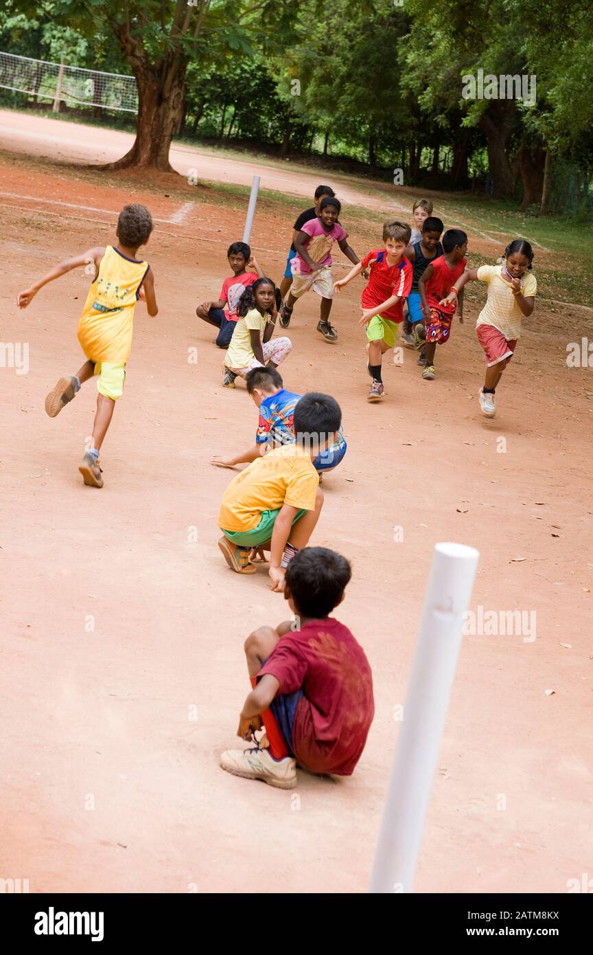 TAMIL NADU, INDIA - The Kho Kho game in an international primary school. Kho Kho is a popular tag and ancient game invented in Maharashtra Stock Photo