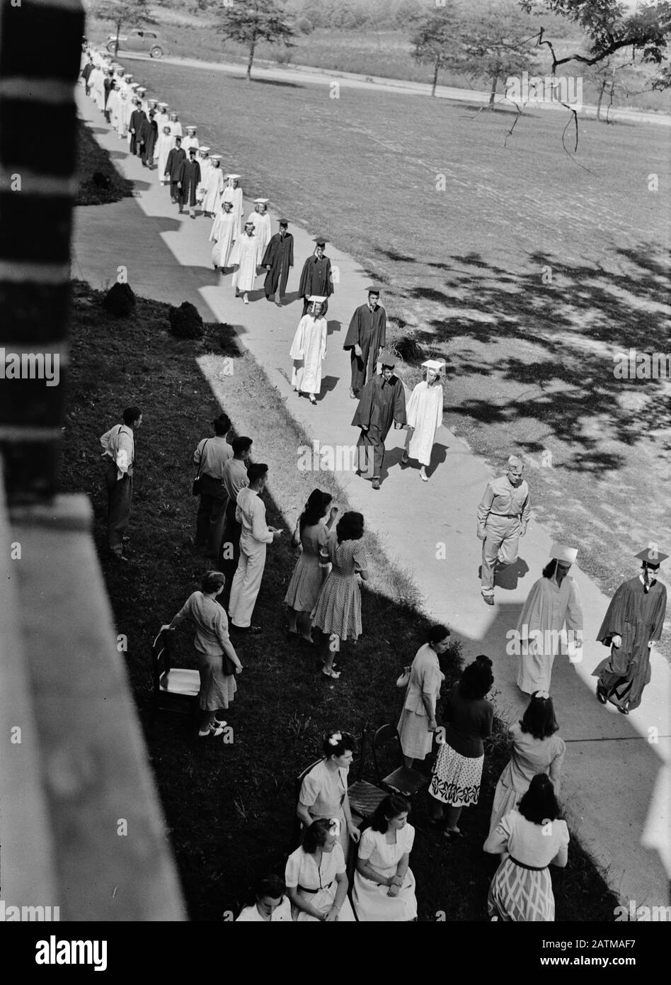 Pomp & Circumstance  Outdoor graduation exercises for 123 high school students in Keysville, Virginia. June 1943 Stock Photo