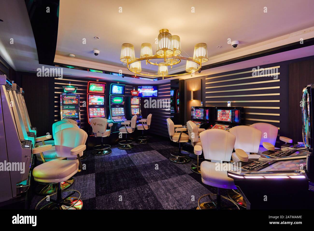 Moscow, Russia, 15.08.2019, casino, large hall with slot machines with armchairs, fortune games, prize winning Stock Photo