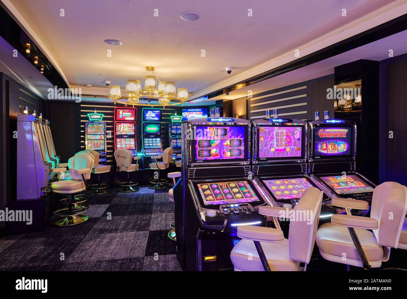 Moscow, Russia, 15.08.2019, casino, large hall with slot machines with armchairs, fortune games, prize winning Stock Photo