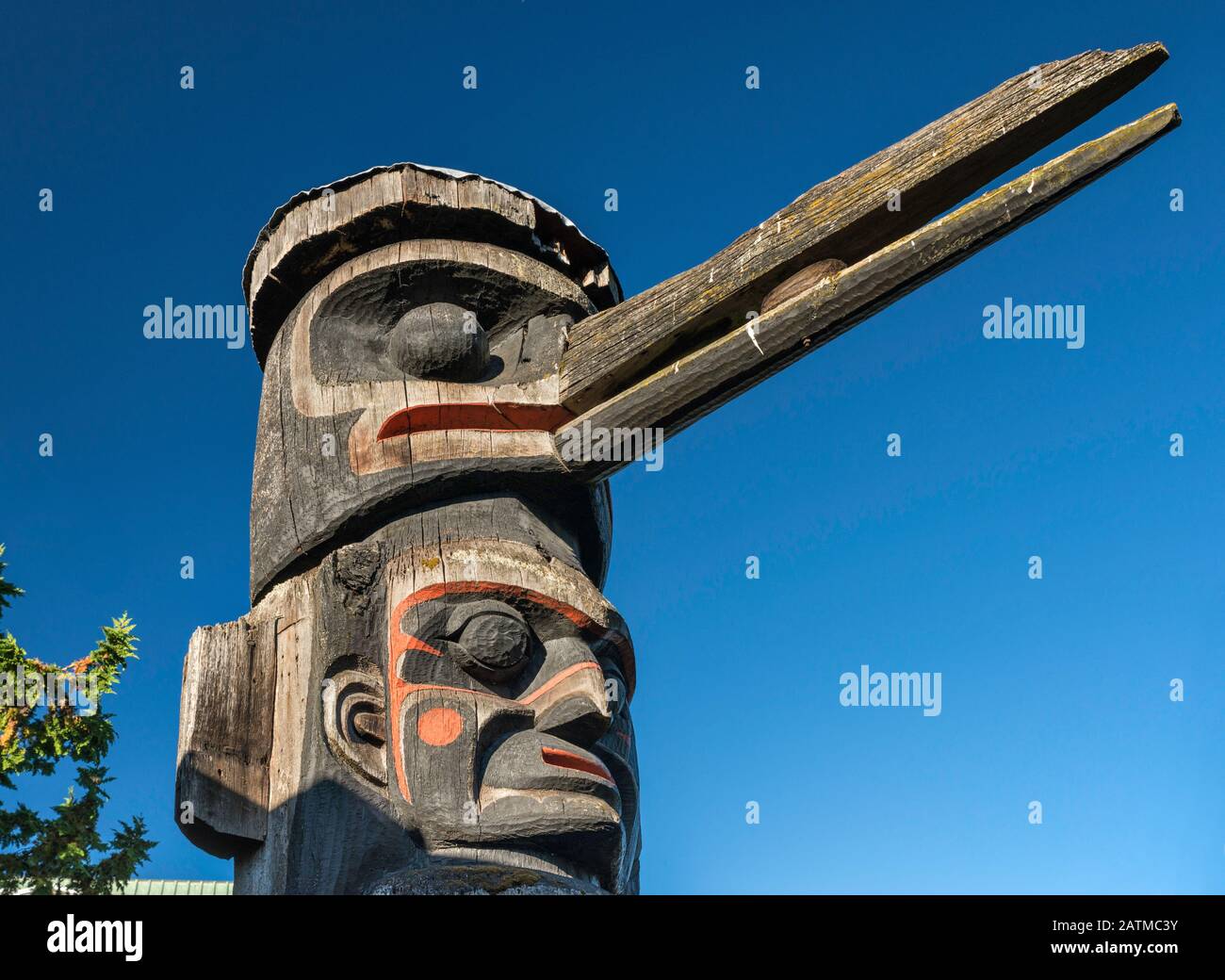 Huxwhukw, a mythical bird on top of totem pole at Thunderbird Park, Victoria, Vancouver Island, British Columbia, Canada Stock Photo