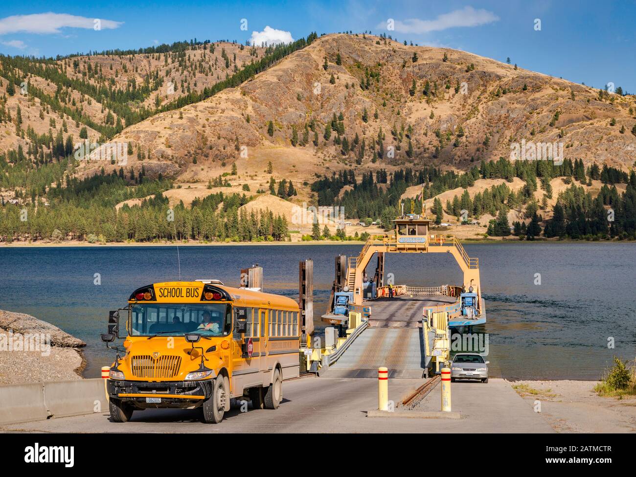 School bus, Columbian Princess Ferry after crossing Franklin D. Roosevelt Lake near Gifford and Inchelium, Lake Roosevelt, Washington state, USA Stock Photo