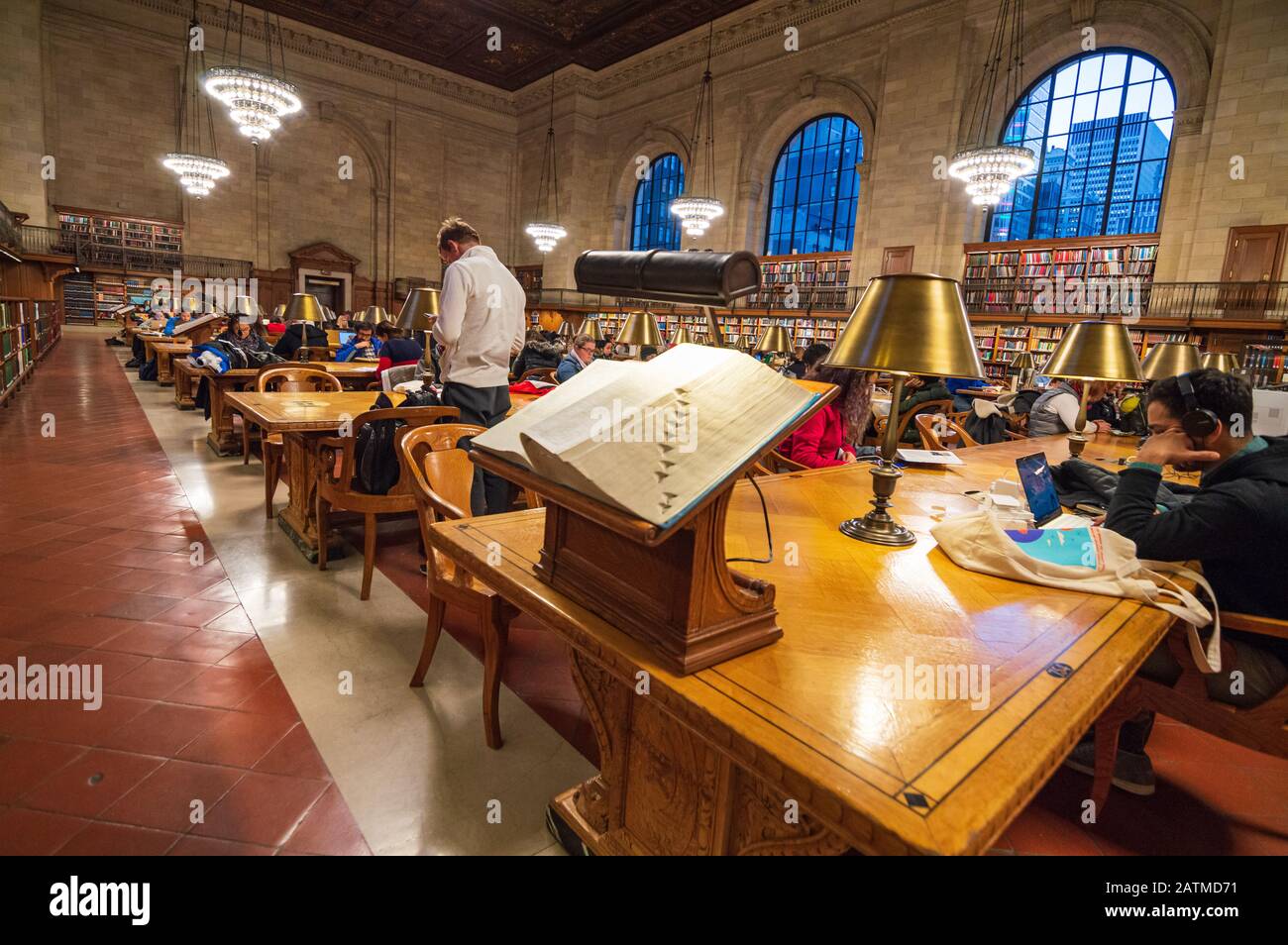 New York City, USA - December 27, 2017: Readers in The New York Public Library est. 1902. Manhattan, NYC. Stock Photo