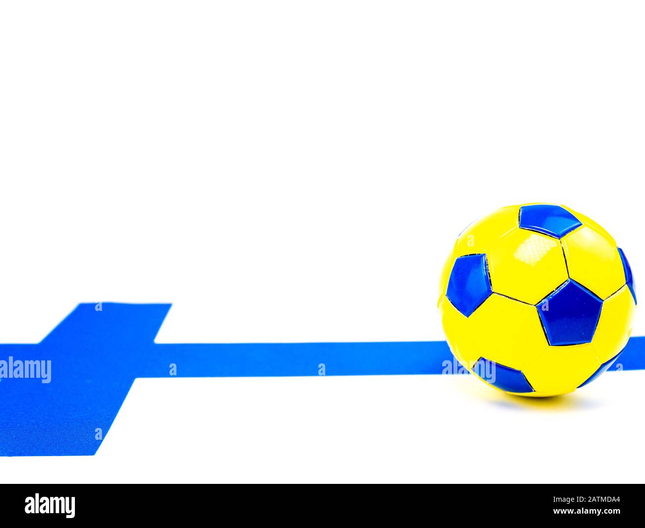 Soccer ball on the background of the flag of Finland. Stock Photo