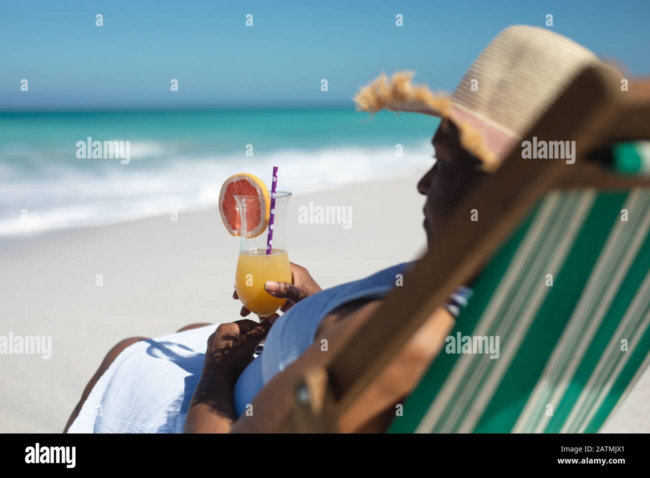 Old woman relaxing at the beach Stock Photo - Alamy