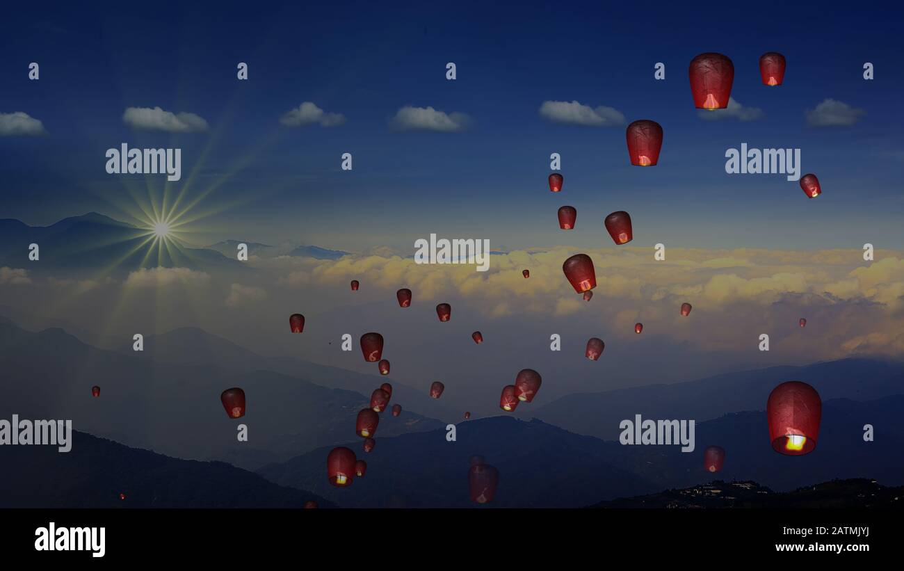 The fire paper lanterns in the night sky with nice background Stock