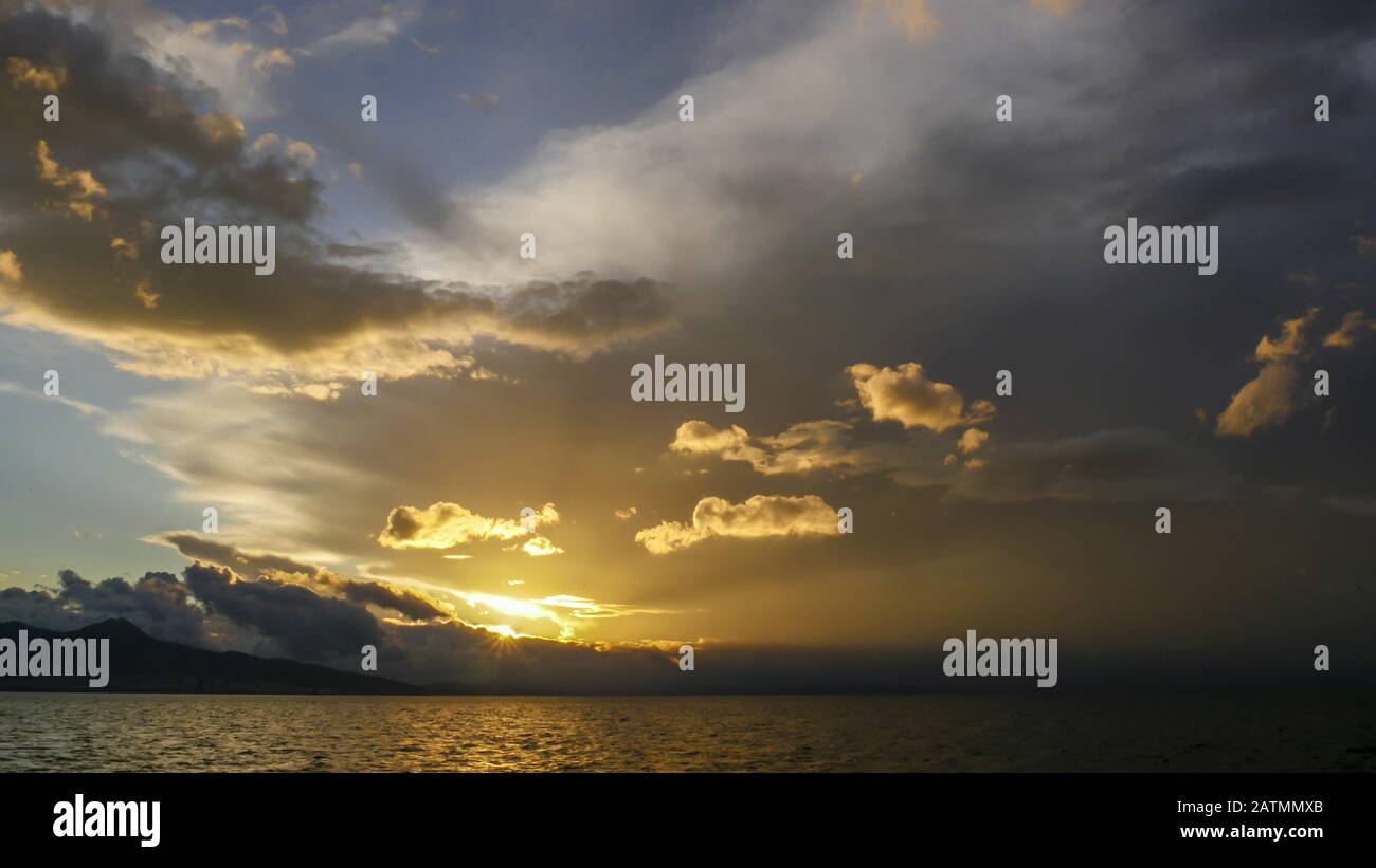 Dark storm clouds with background,Dark clouds before a sunset and thunder storm. Stock Photo
