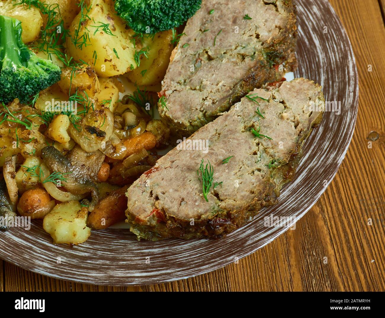Meatloaf with Potatoes and Carrots with the olive oil, and season Stock