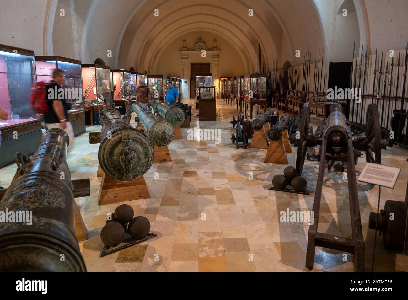 The Palace Armoury in the Grandmaster Palace interior in Valletta, Malta, collection of cannons, arms, weapons, armours and military equipment of Knig Stock Photo