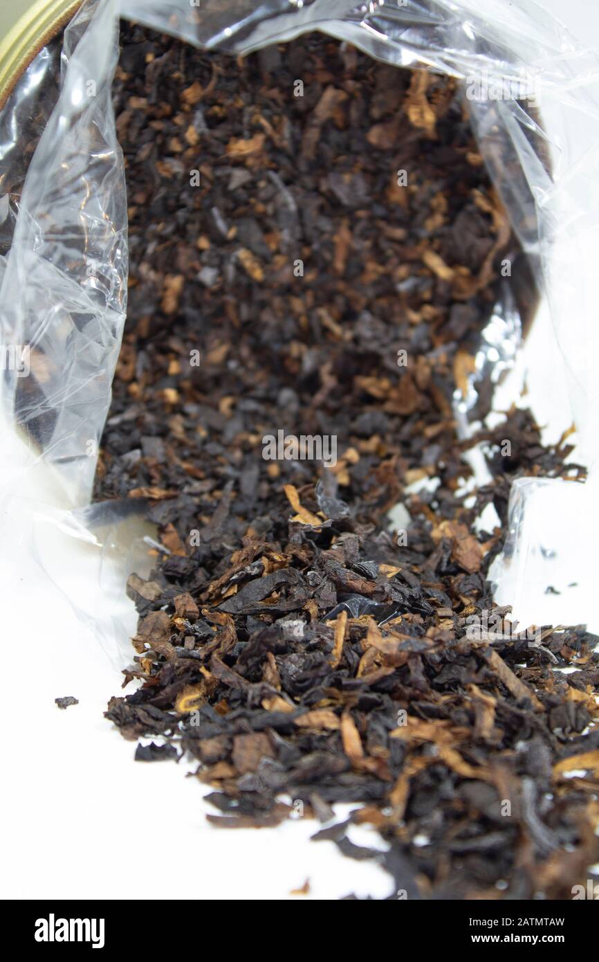 Pipe tobacco freshly poured from the can Stock Photo