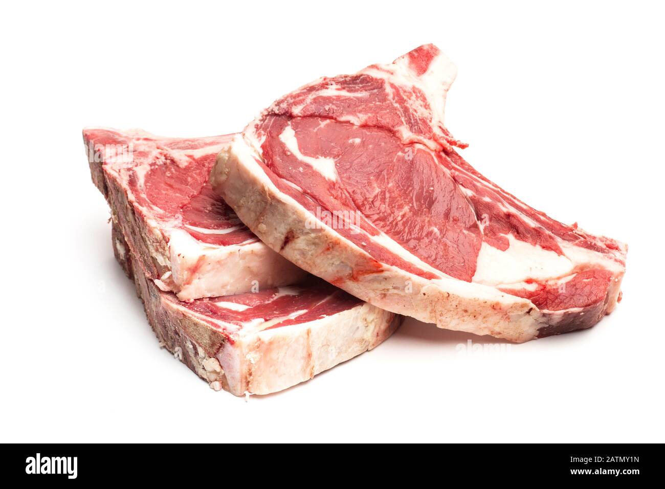 Three Veal steaks isolated on a white background Stock Photo