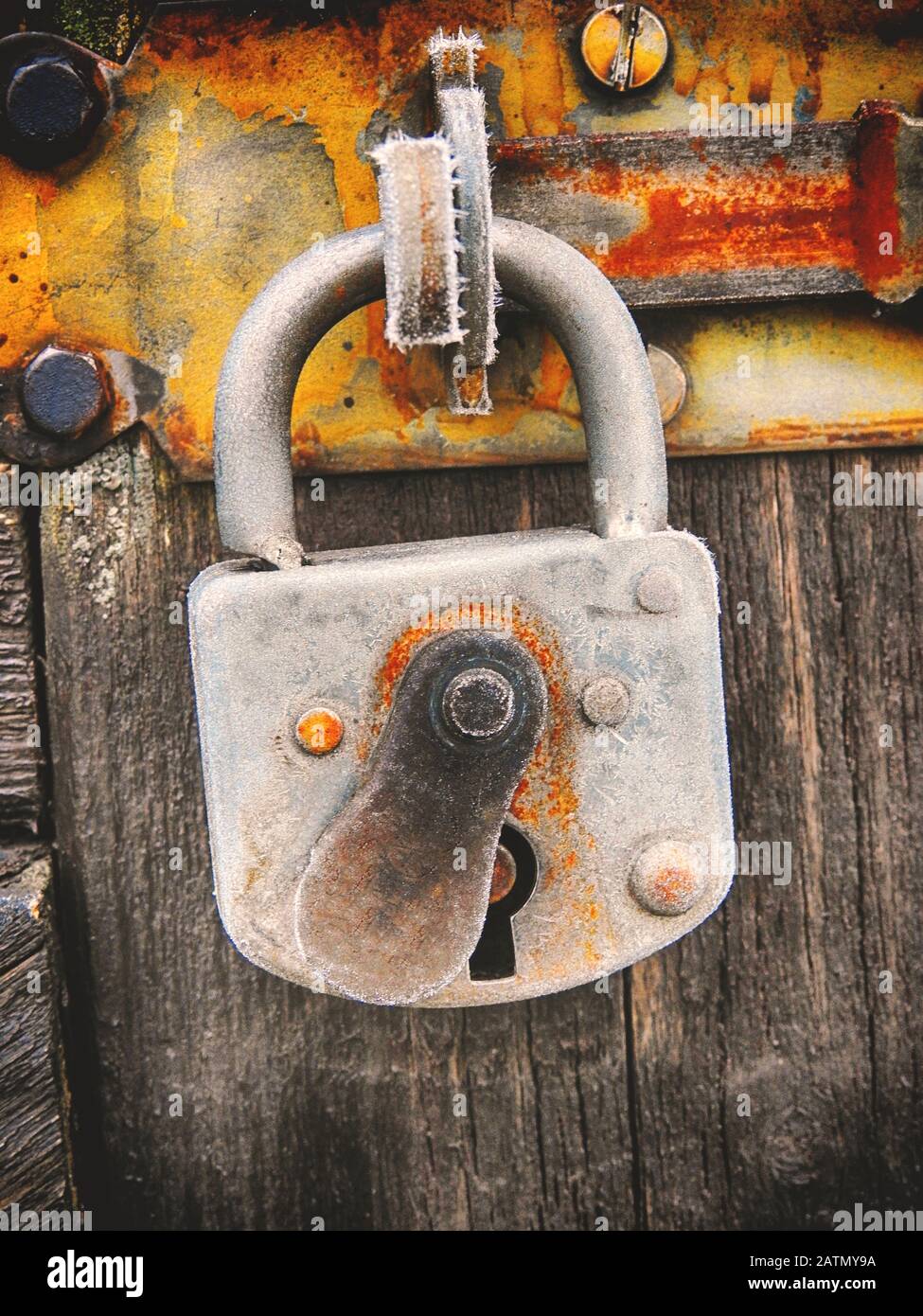 Rusty and icy lock Stock Photo - Alamy