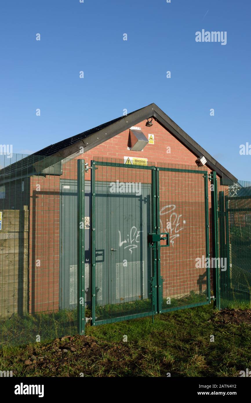 Steel security fencing protecting brick building in radcliffe bury lancashire uk Stock Photo Alamy