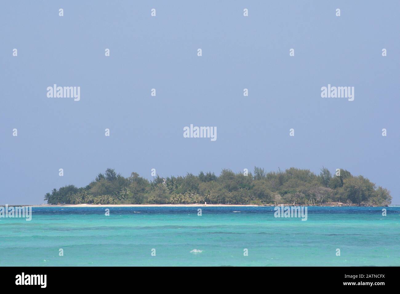 Managaha Island surrounded by blue waters of the Saipan lagoon, Northern Mariana Islands Stock Photo