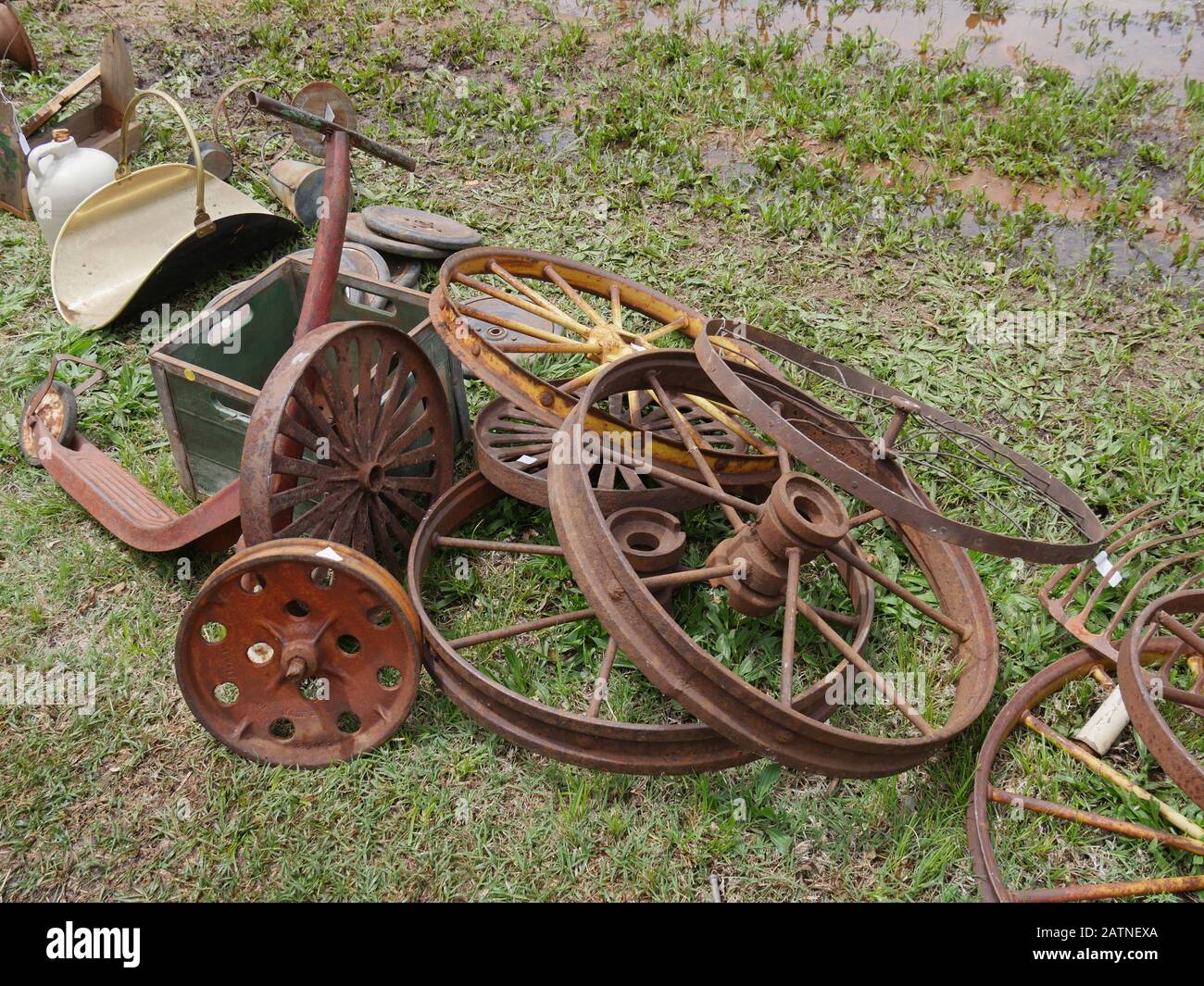 Pile of assorted rusty tire rims sold at a flea market Stock Photo Alamy
