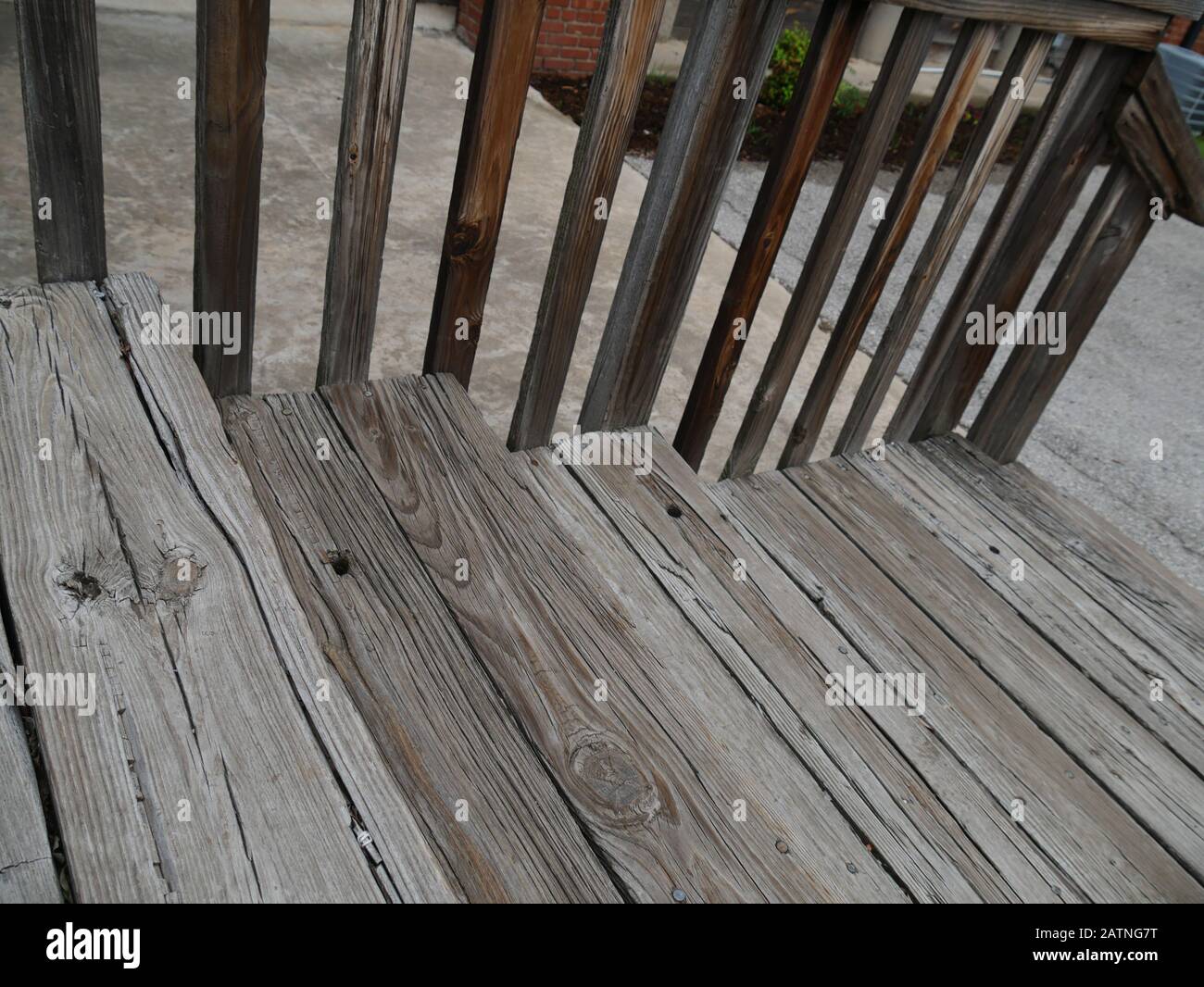 Wooden rungs of a stairs with wooden railings Stock Photo - Alamy