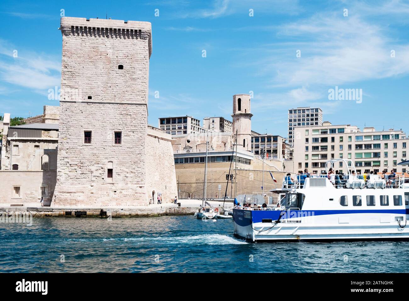 MARSEILLE, FRANCE - MAY 17, 2015: A view of the Fort Saint-Jean, built in the seventeenth century, in Marseille, France, surrounded by the Mediterrane Stock Photo