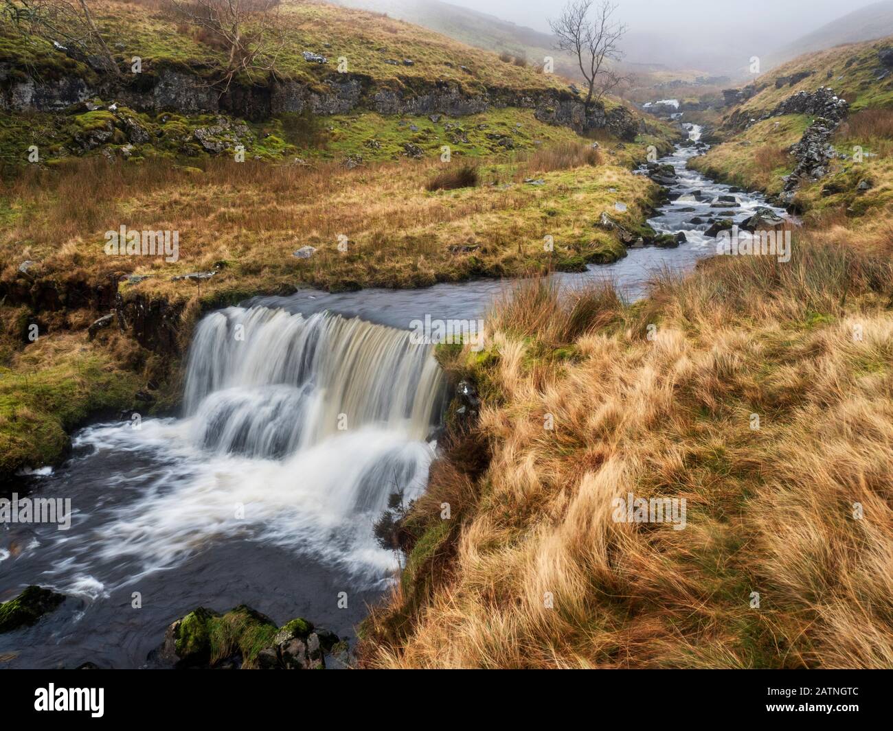 Waterfalls in Force Gill near Ribblehead Yorkshire Dales National Park England Stock Photo