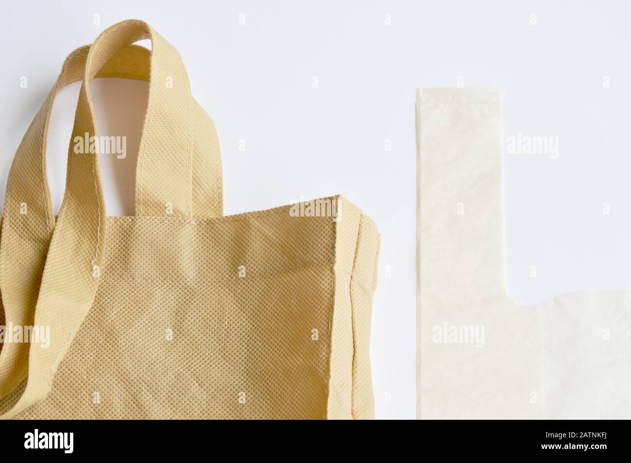 fabric and plastic bag optional for environment concern on white background Stock Photo