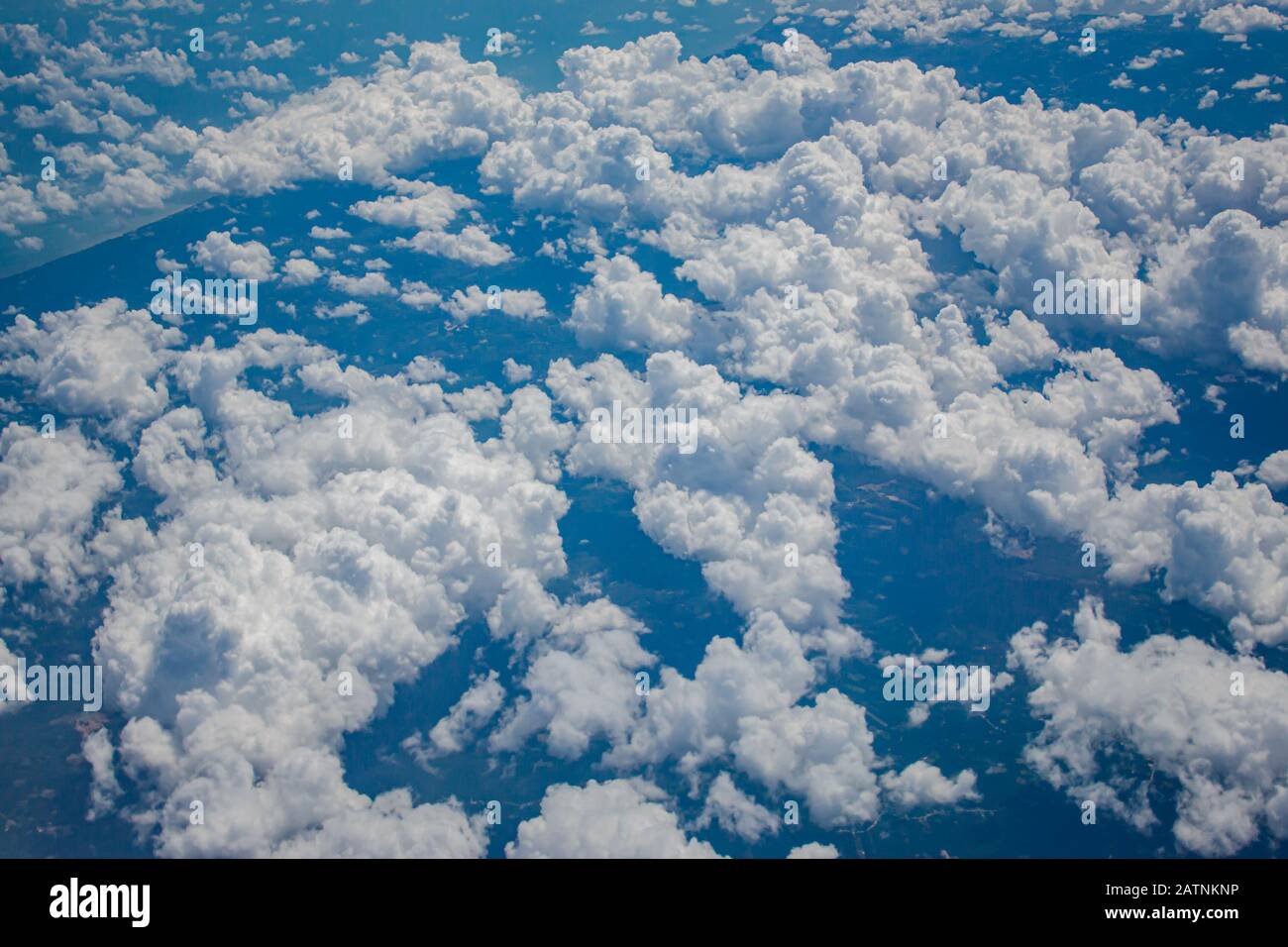 Beautiful blue sky and some clouds view from the airplane Stock Photo ...