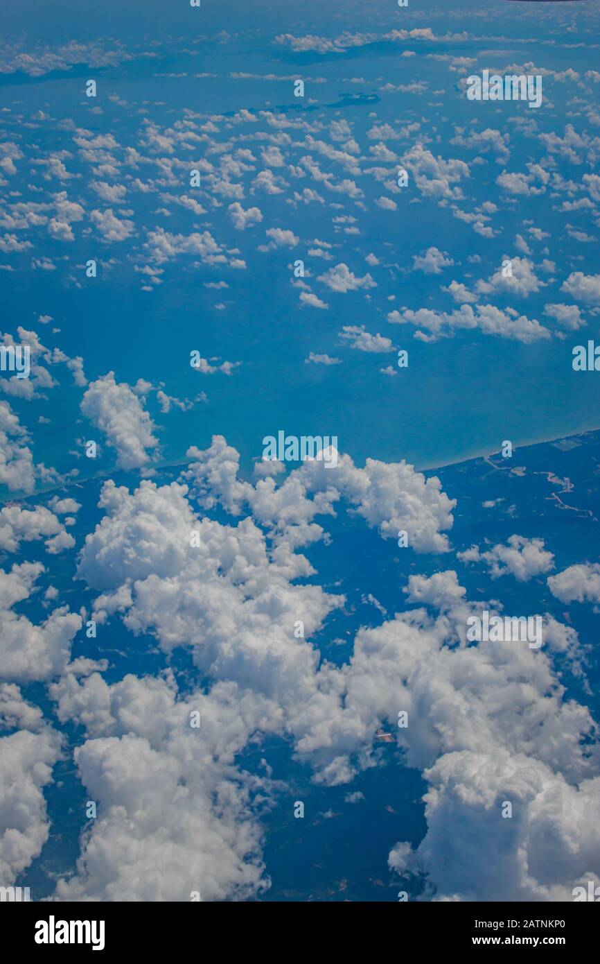 Beautiful blue sky and some clouds view from the airplane Stock Photo ...