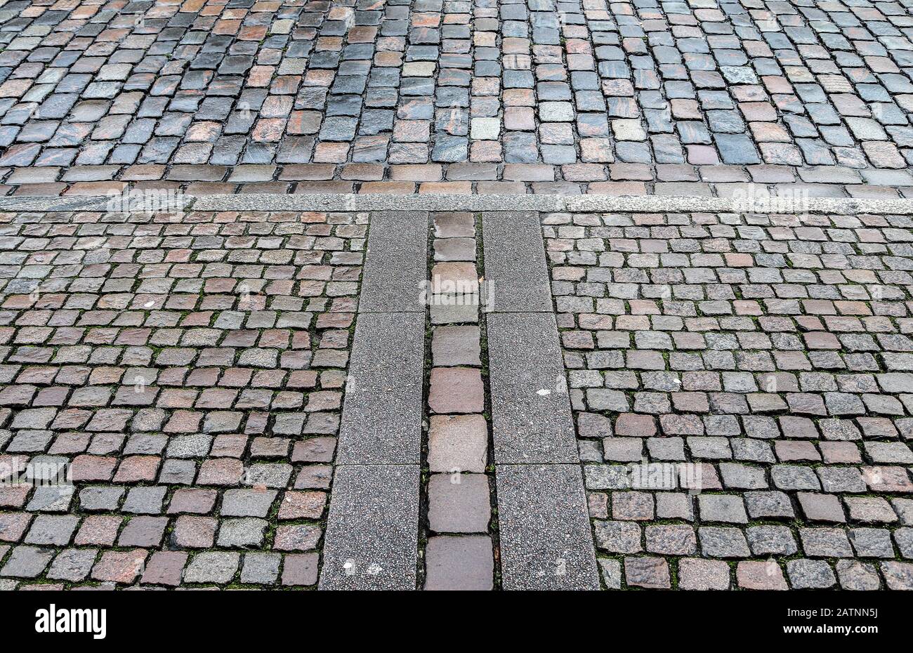 Detailed close up on old cobblestone roads in urban areas and old towns ...