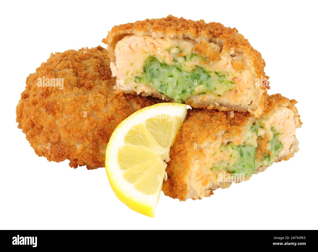 Breadcrumb covered salmon fish cakes with watercress sauce isolated on