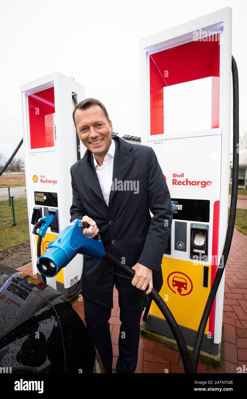 04 February 2020, Hamburg: Jan Toschka, filling station manager for  Germany, Austria and Switzerland Shell Deutschland Oil GmbH, stands at a  new charging station for electric vehicles at a press event of