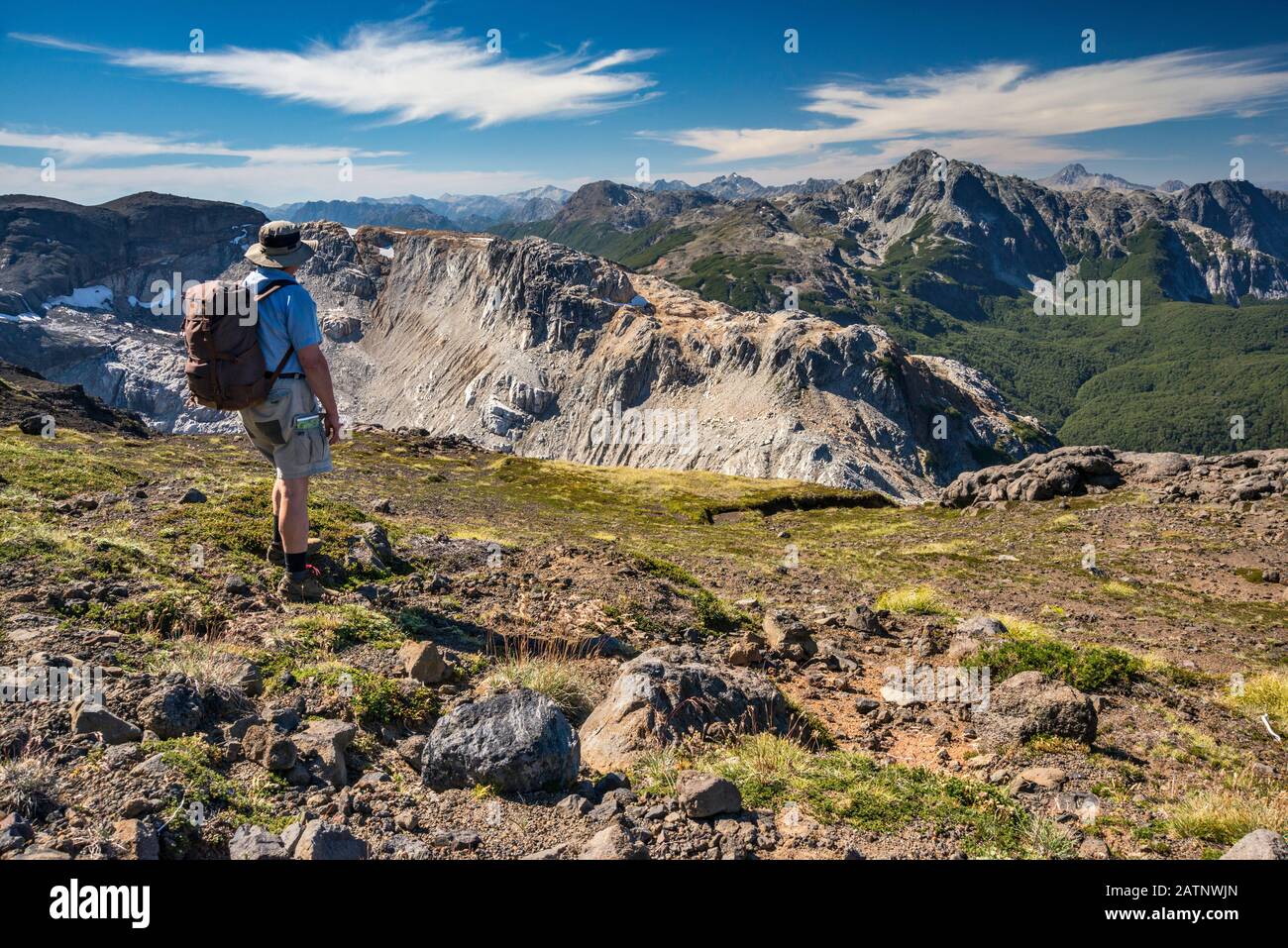 Hiker looking at Cerro Constitucion from trail to Refugio Otto Meiling, Andes Mountains, Nahuel Huapi National Park, Patagonia, Argentina Stock Photo