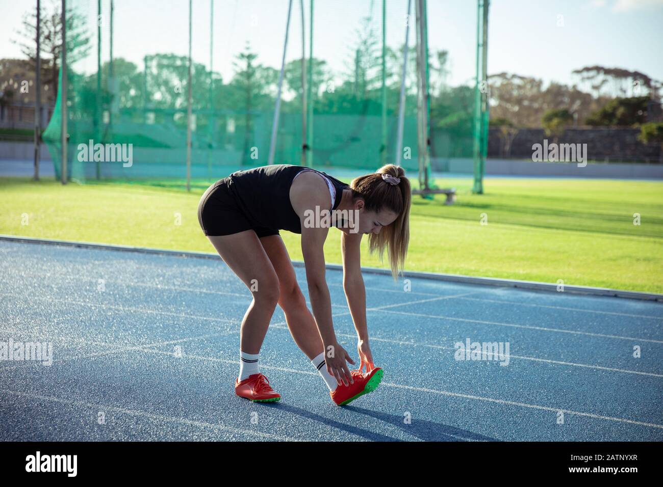 Athlete stretching hi-res stock photography and images - Alamy