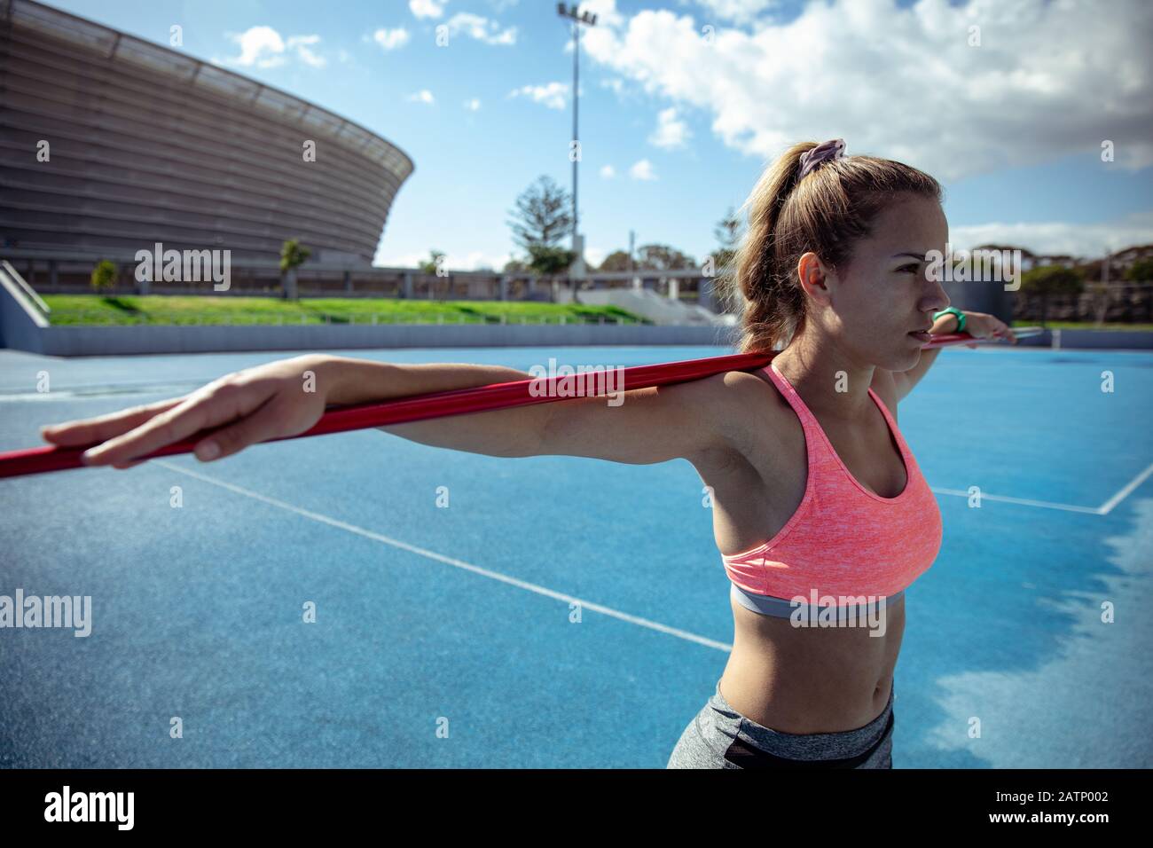 Athlete with a javelin at the stadium Stock Photo