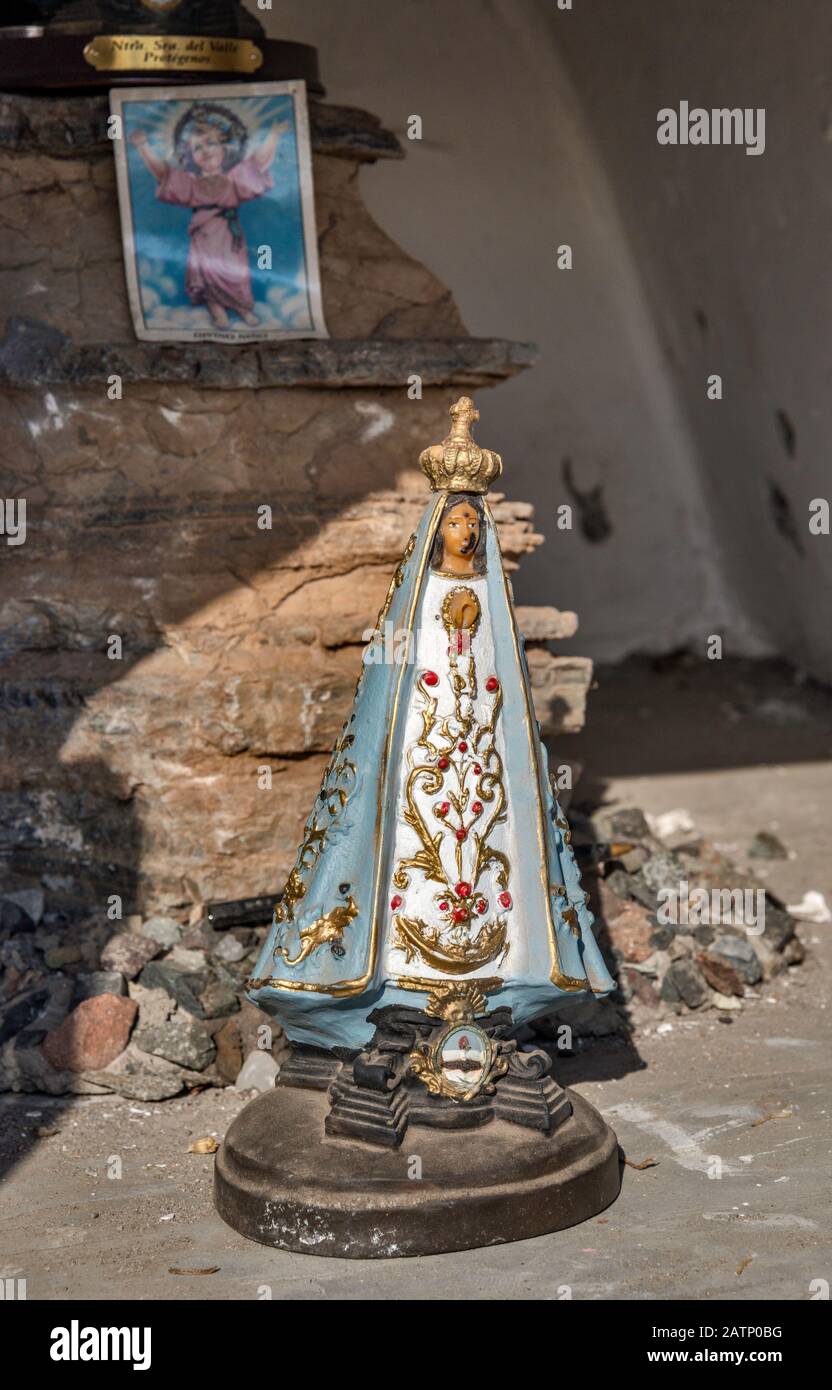 Figure of Virgin Mary at roadside shrine near town of Los Antiguos and Lago Buenos Aires aka Lago General Carrera, Patagonia, Argentina Stock Photo