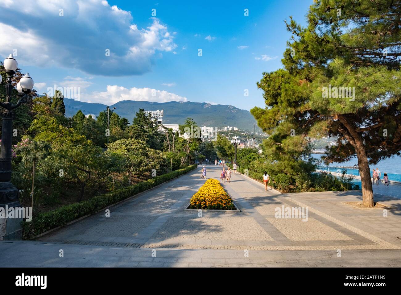Yalta, Crimea - September 2, 2019: Embankment on the Black Sea coast on a summer sunny day. Stock Photo
