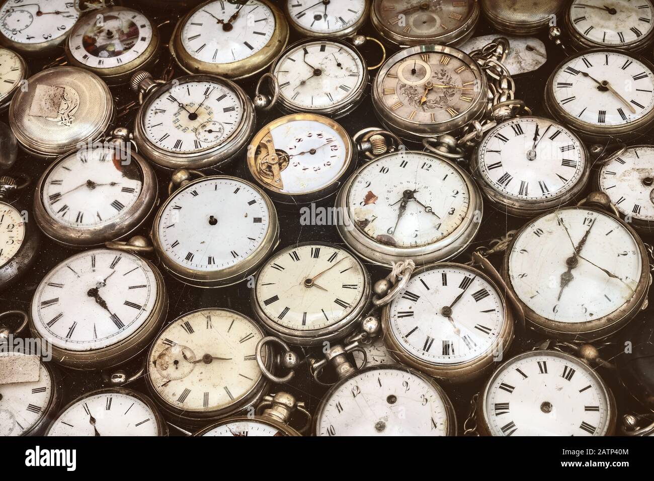 Retro styled image of old scratched and run down pocket watches Stock Photo