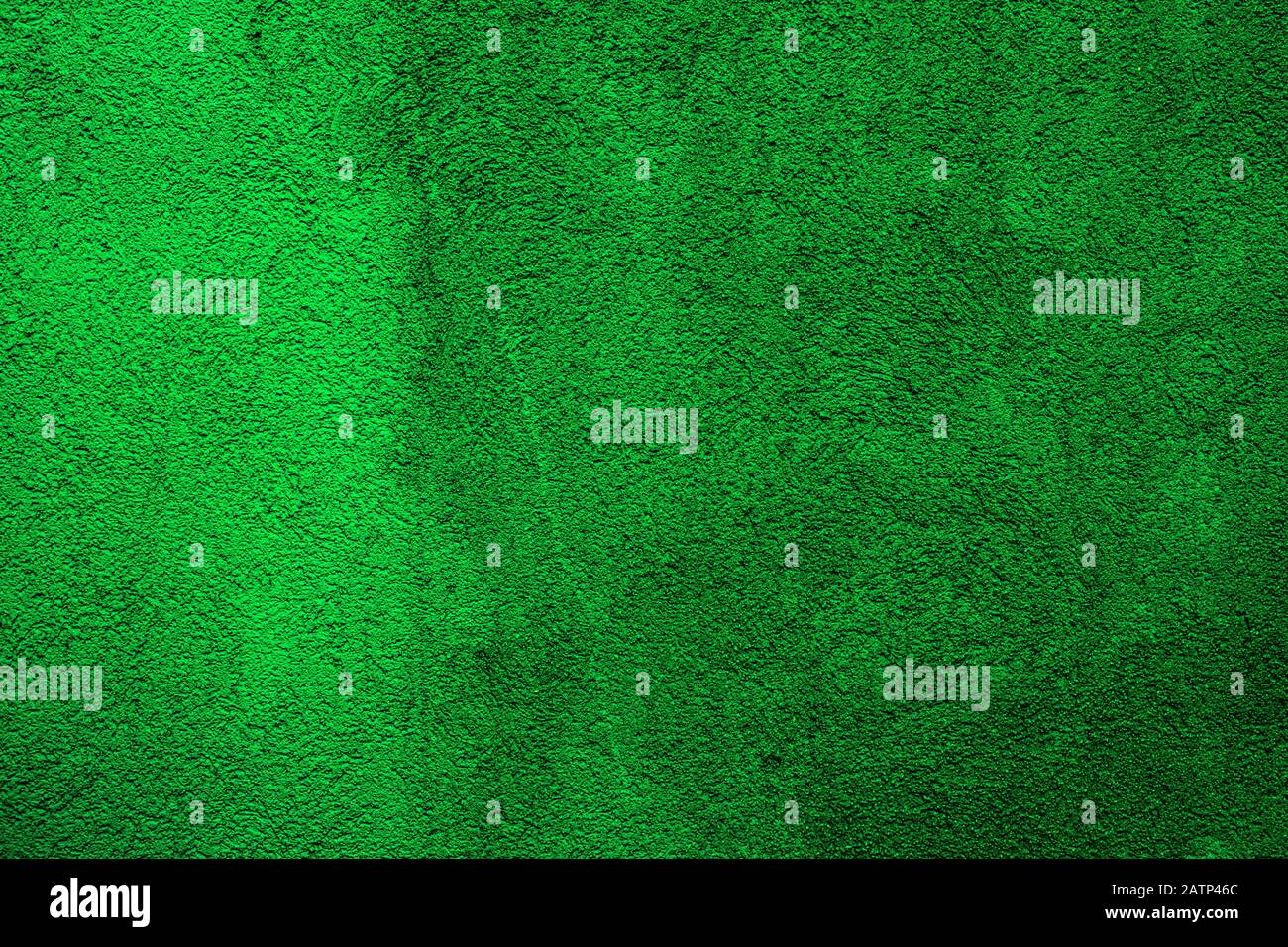 Green colored abstract wall background with textures of different