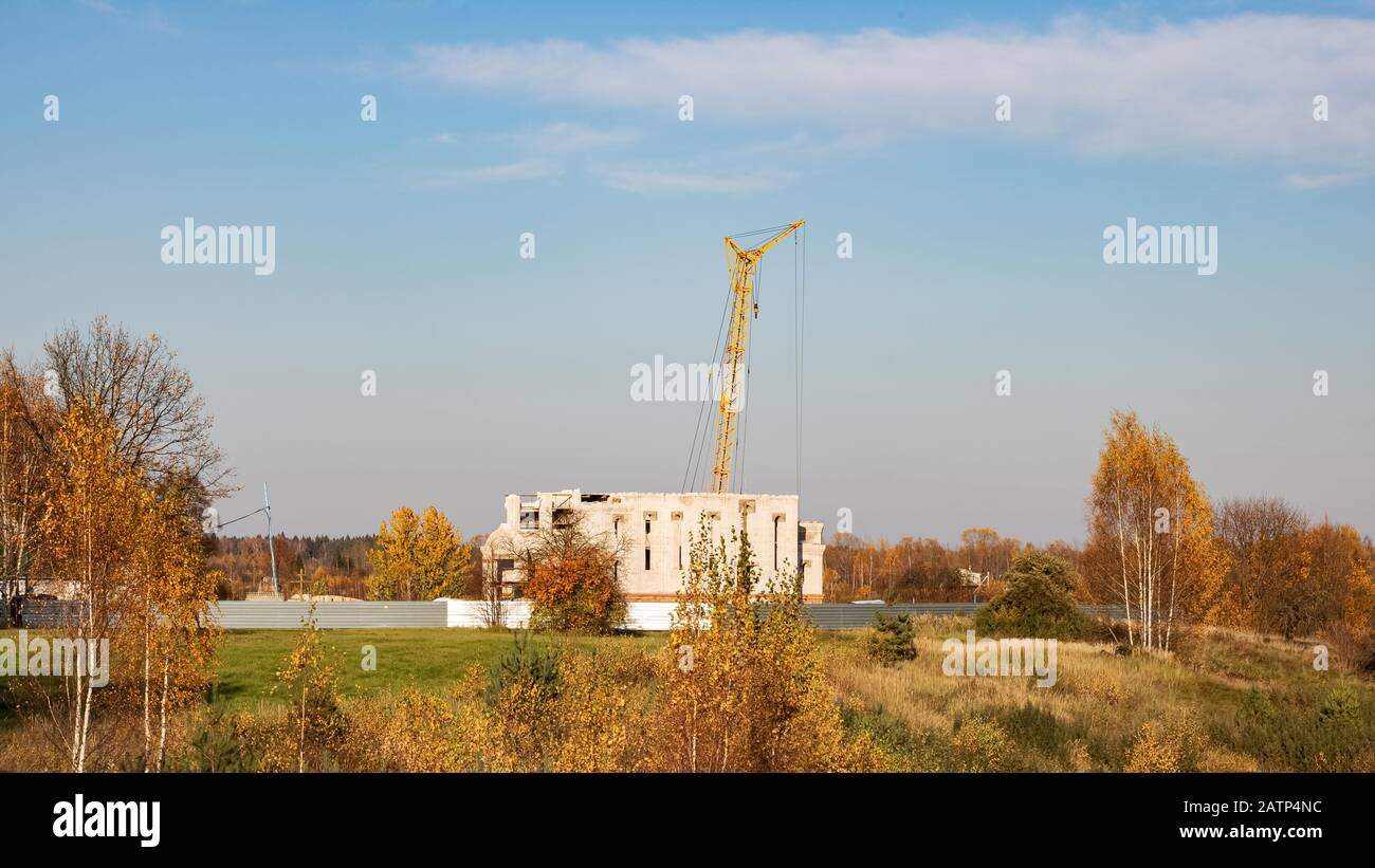 House construction and construction cranes close up Stock Photo Alamy
