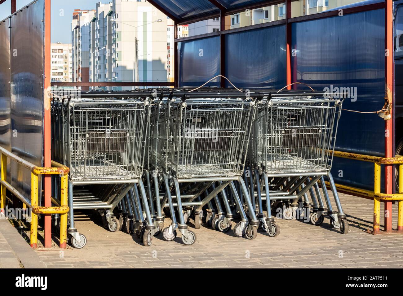 Lots of grocery carts in a supermarket Stock Photo Alamy