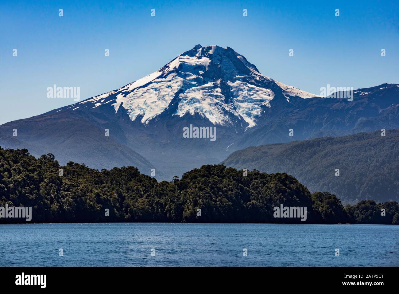 Volcan Maca over Aisen Fjord west of Puerto Chacabuco, Aysen Region, Patagonia, Chile Stock Photo
