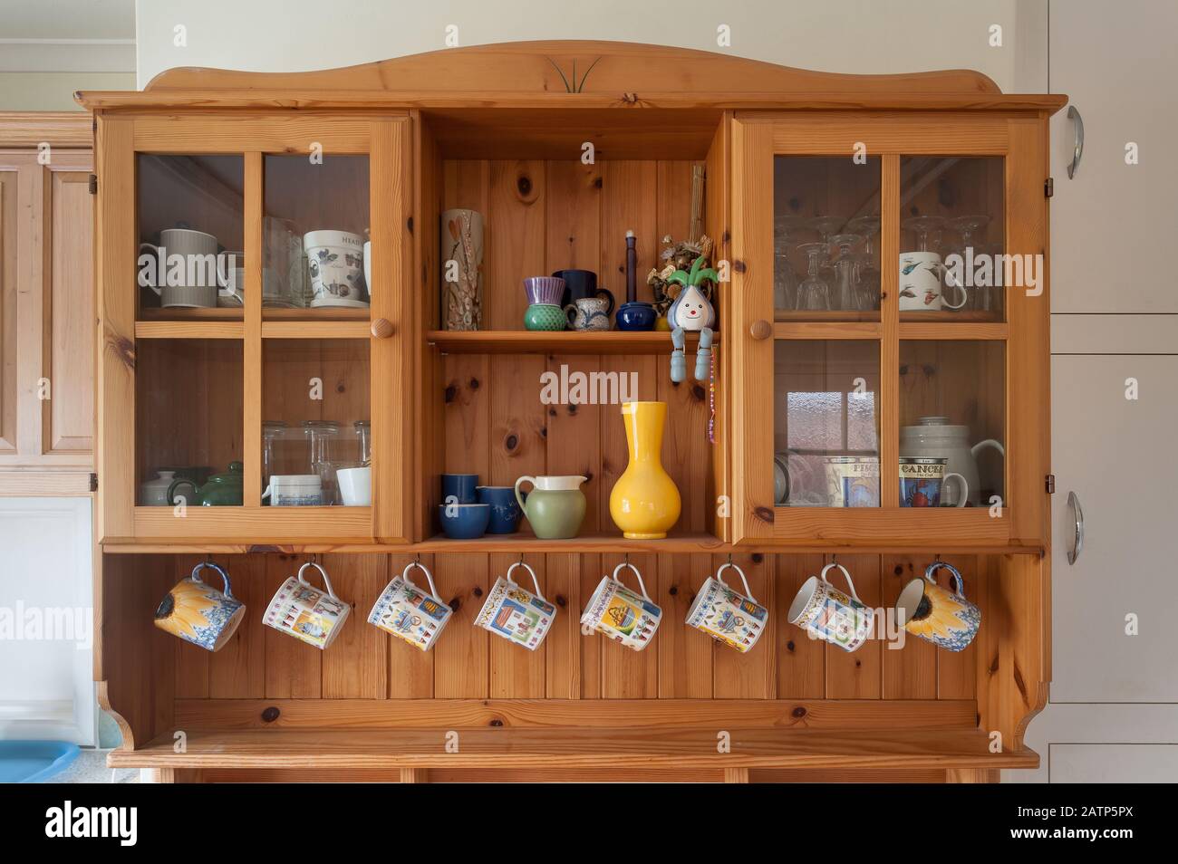 Obsessive compulsive disorder where everything has to be organised in the kitchen welsh dresser is just such a way for neatness methodically, arranged Stock Photo