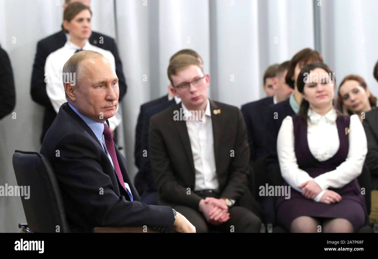 Cherepovets, Russia. 04 February, 2020. Russian President Vladimir Putin, left, hosts a meeting with members of the public during a visit to the Vologda Region February 4, 2020 in Cherepovets, Russia.   Credit: Evgeny Biyatov/Kremlin Pool/Alamy Live News Stock Photo